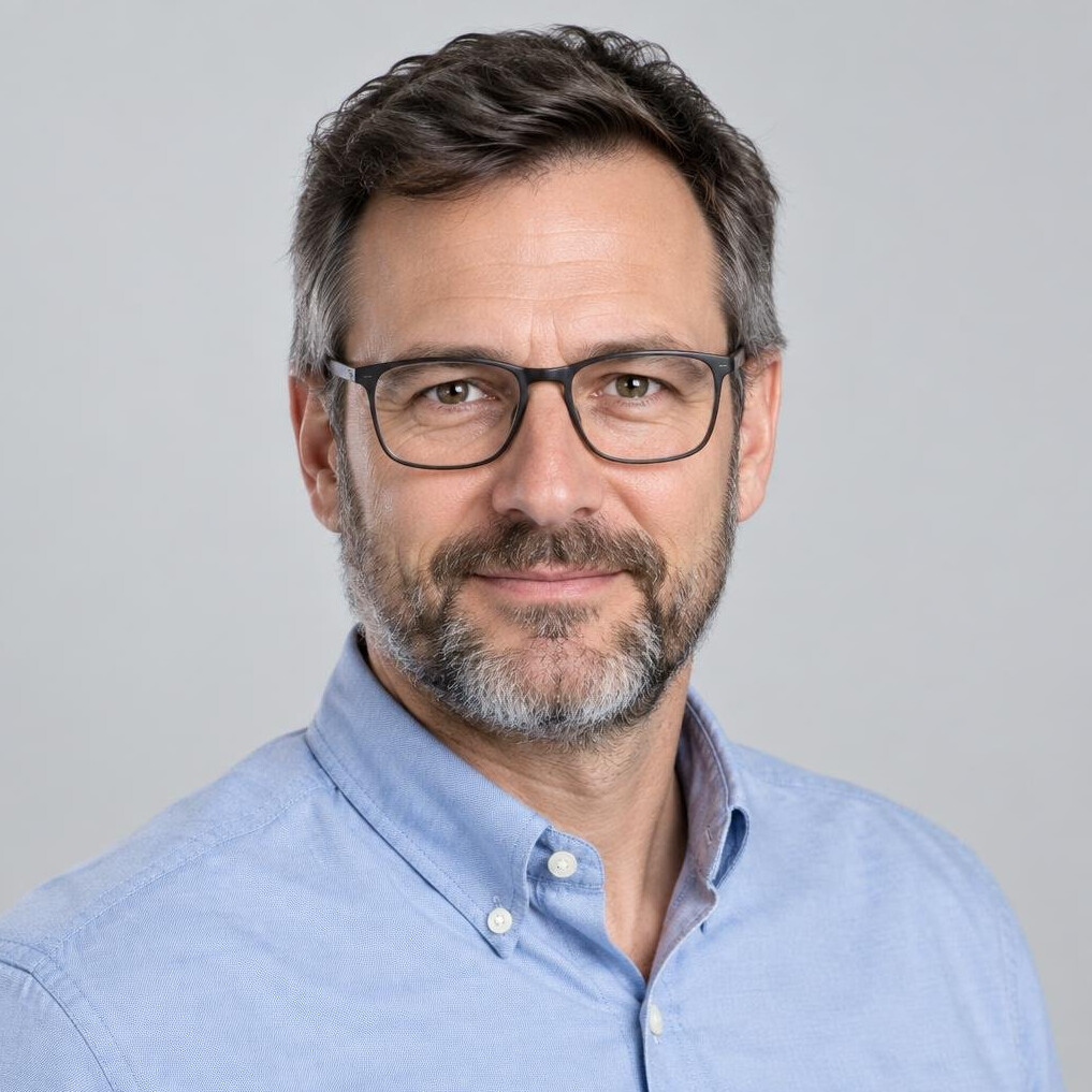 Studio portrait of a man in his 40s with short beard